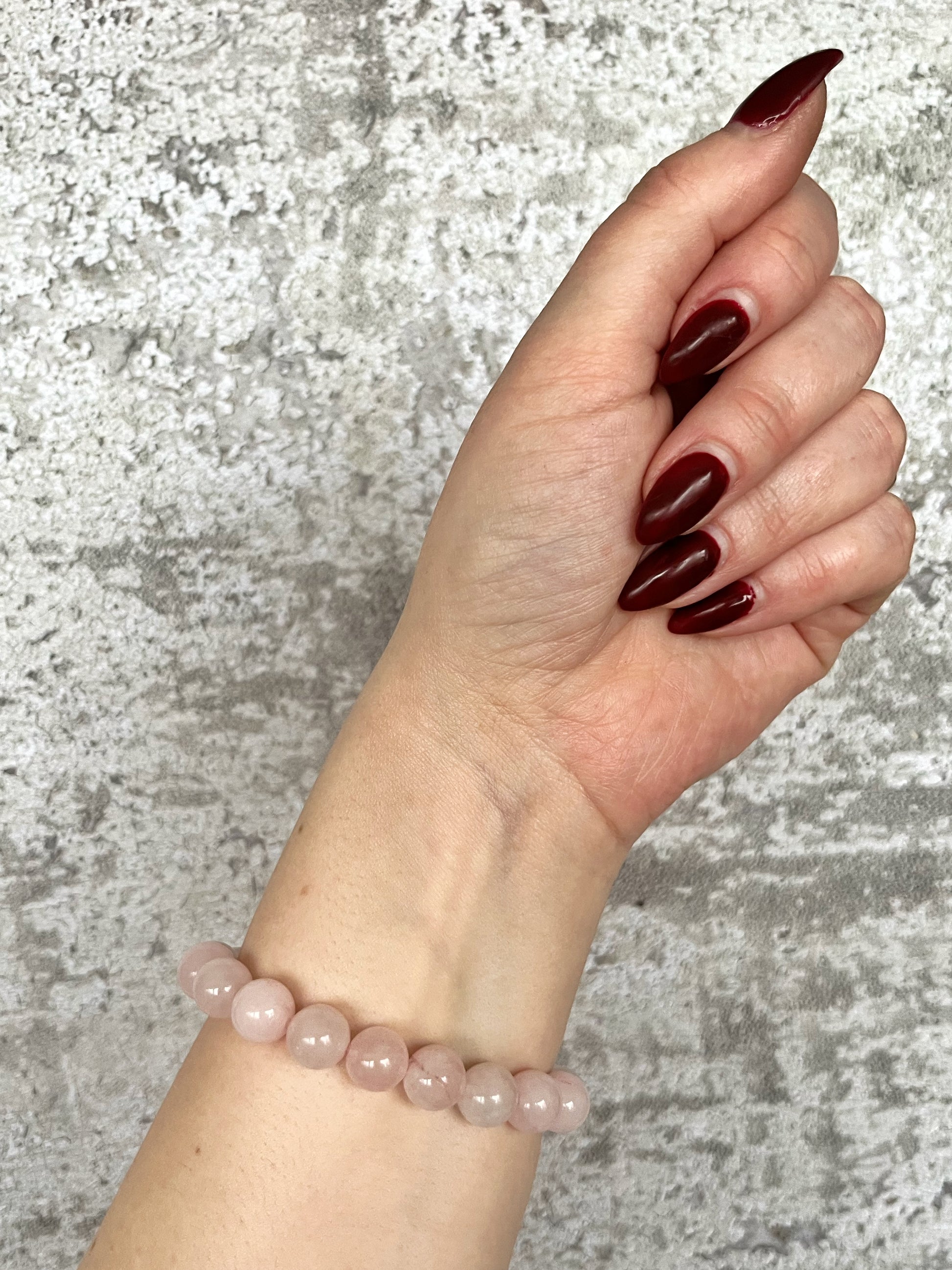 Håndlavet krystal armbånd med rosa kvarts perler.