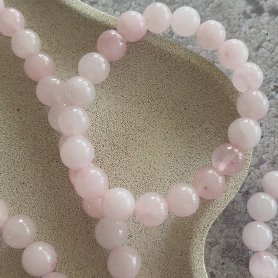 Håndlavet krystal armbånd med rosa kvarts perler.